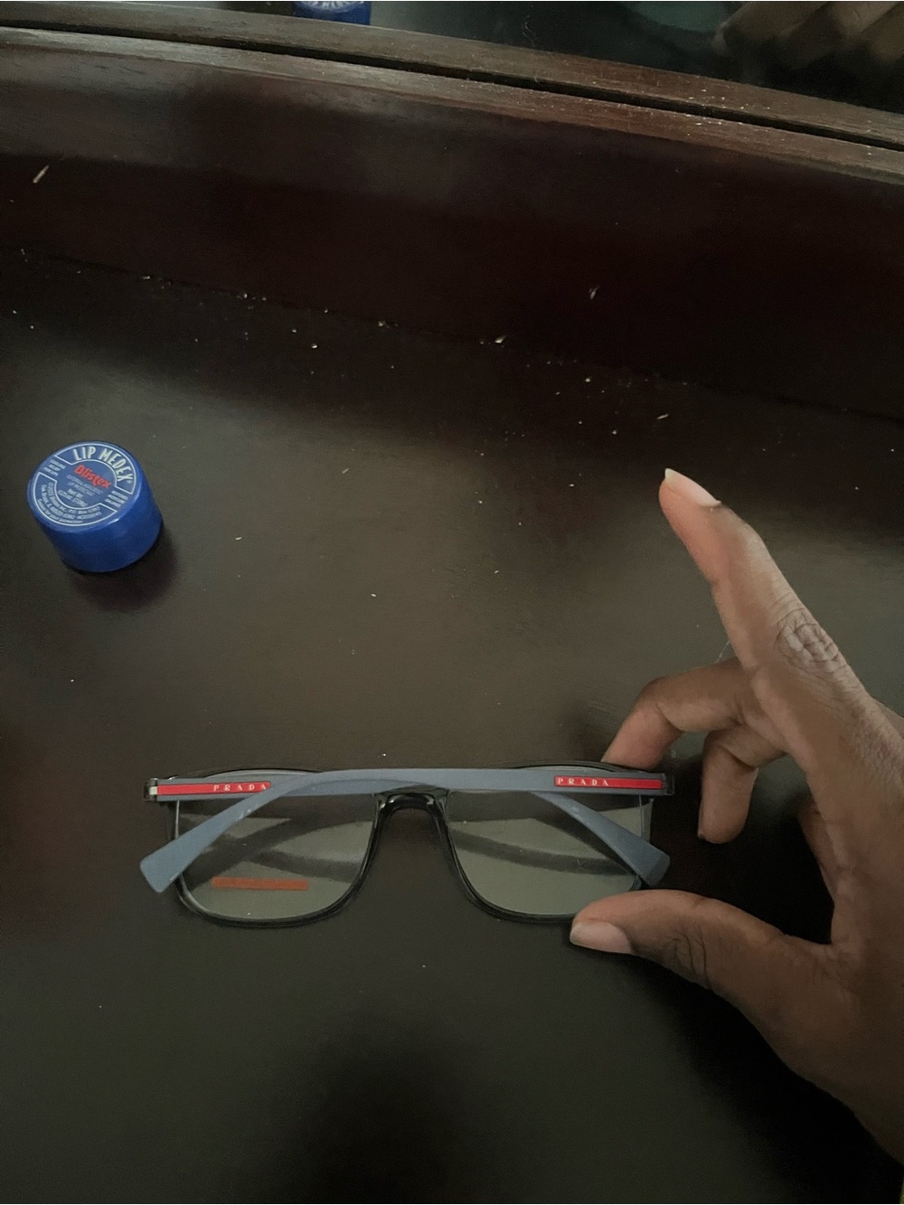 Prada Men's Gray Sunglasses with Red Accents